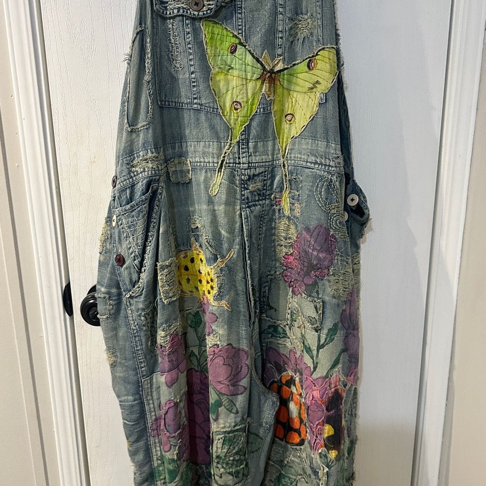 Magnolia Pearl Distressed Denim Jumpsuit with Butterfly and Floral Design